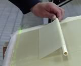 each sheet is rolled into a metal cylinder
